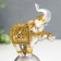 Souvenir Polystone "Elephant on a ball in the openwork blanket" 19x8.5x5.5 cm