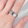 Ring "rotation", white color in silver, 17 size