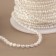 Beads on threads, with holography, round, 3 mm, 9 ± 1 m, white color