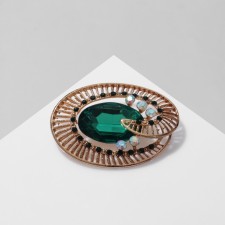 Eye brooch, emerald color in gold