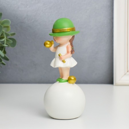Souvenir Polystone "Baby in a green hat, with a gold bubble on the ball" 16x7x7 cm