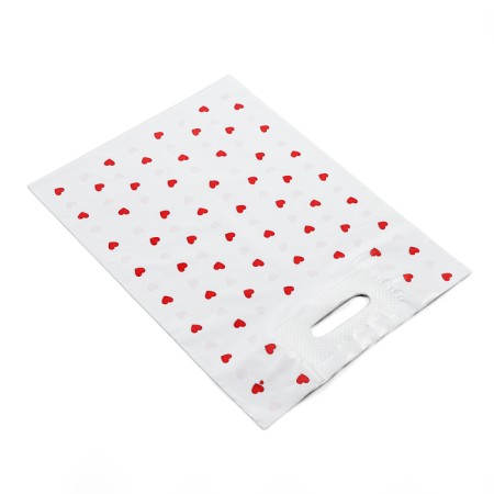 Polyethylene package with a cut with a reinforced handle, "hearts" 30 x 40 cm, 50 μm-1