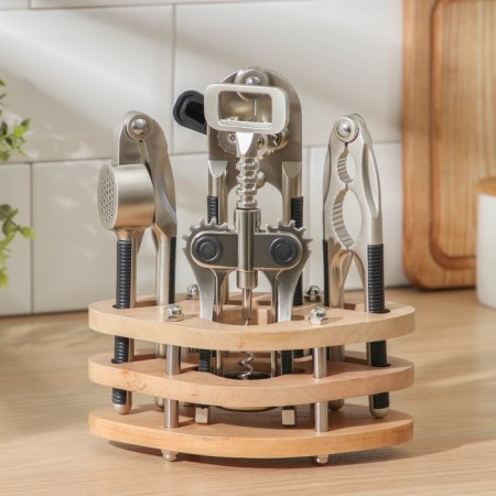 A set of Veles kitchen tools, 4 items, on a stand