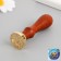 Printing for wax with a wooden handle "Kit floats in the city" 9x2.5x2.5 cm