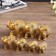 Souvenir Polystone "Golden Elephants - Roots of Trees" Nr 7 pcs H = 9; 8.5; 7.7; 6.5; 6.2; 5.4; 4.2 cm