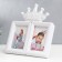 Photo frame plastic in 2 photos 10x15 cm "crown" white 30x28 cm