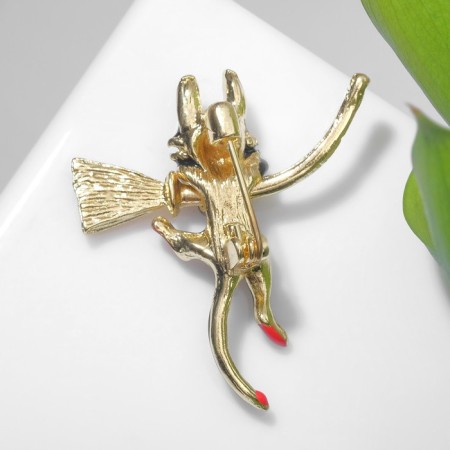 Brooch "Cat" on a broomstick, color in gold-2