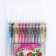 A set of gel pens, 12 colors, with sparkles, with a rubber holder, in a plastic box