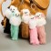 Fluffy on the ring "Poodle with colored ears and tail and bow" mix 18.5x6x5 cm