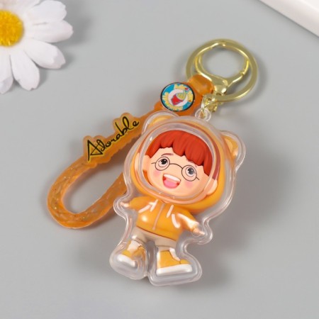 Trick rubber with carbine, strap "Boy in the orange sweatshirt" 7x4.5x3.5 cm-2