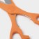 A set of kitchen knives on a stand, 8 knives, knife, scissors, orange color