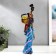 Polystone souvenir "African in a colored dress, with a fruit basket" mix 32.5x10x8 cm