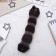 A roller with a mount and an elastic band for creating a beam 4x18cm, brown