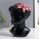 Polystone souvenir "Baby with lily in her hair and butterfly" Black 23x17x7 cm