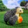 Garden figure "Hedgehogs with an apple" 12x15x14cm