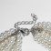 Beads "Pearl cascade", 9 threads, beads No. 6, 14, milk color in silver, 70 cm