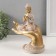 Polystone souvenir "Buddha in a white robe. At a palm" 9x16.5x22.5 cm