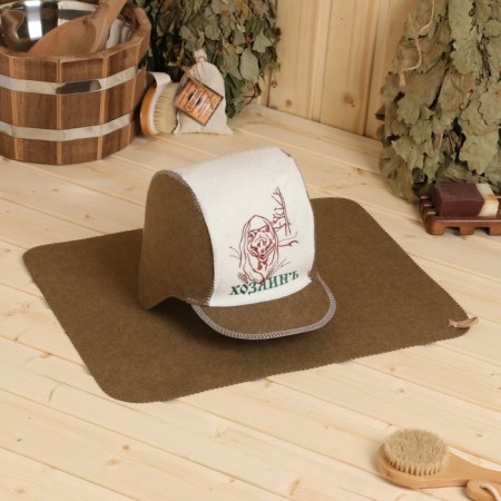 Set for the bath: the hat and rug "owner" green