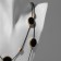 Beads 2 tiers "ovals" Black color in gold, 54 cm
