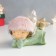 Polystone souvenir "Girl in a fluffy pink hat lies with a poodle on her back" 13.5x9x9 cm