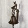 Souvenir metal bell "Bird on a branch" 24x12x7.5 cm