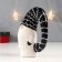 Souvenir ceramics "Santa Claus, black cap, white zig-zag, with a bag" 16.5x11x7.5 cm
