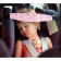 The bandage-fixer is a children's front, to support the head in the car seat, giraffes, pink