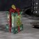 LED figure “Green Gift with a Christmas tree” 6.3 × 11.5 × 6.3 cm, plastic, batteries AAAX3 (not in the kit), flame effect
