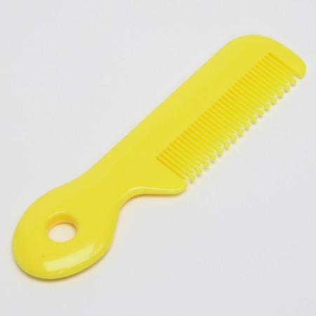 A child’s care set, 5 items (comb, tweezers, scissors, a knipser, saw), yellow color 6-7