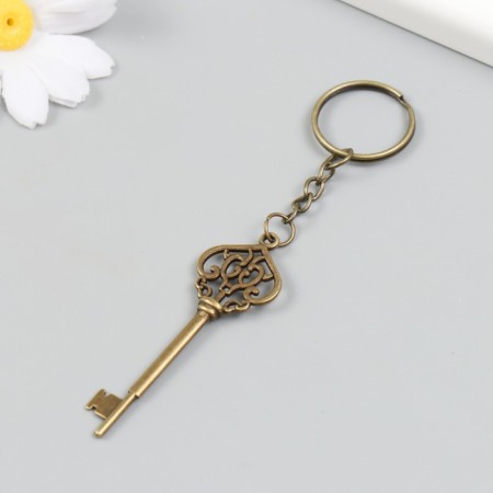 Metal keychain "Key - openwork" bronze 2.2x6.9 cm-1