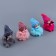 Soft toy "Doll" in a knitted hat, on a key fob, 11 cm, color mix
