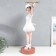 Souvenir Polystone stand "Baby with ears, in a white dress with a dish" 81x40x40 cm