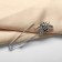 Bulavka "Bee" with rhinestones, 5.5cm, black and white color in silver