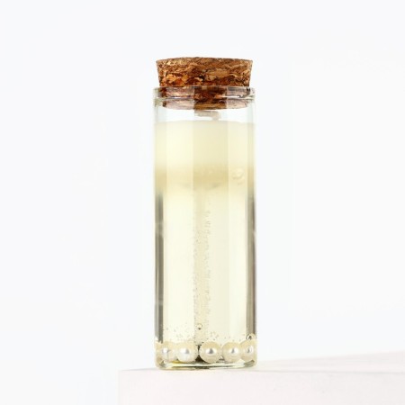 Interior candle in a pearl flask 3x3x8cm-1
