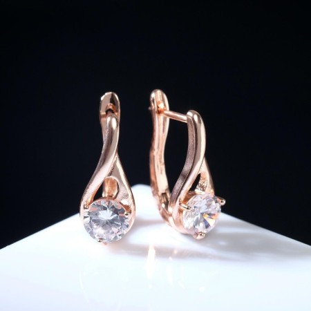 Earrings with rhinestones "Magic" bead in a drop, the color is white in pink gold-1