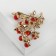 Brooch "Coral Branch", red-green color in gold