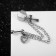 Earring "Kaff" Chain with a cross, the color of silver