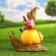 Garden figure "Dwarf on the snail" 30x27x15cm