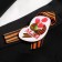 Wooden icon with the ribbon "May 9" Red tulips