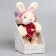 Soft toy "Little Friend", skiing, red scarf