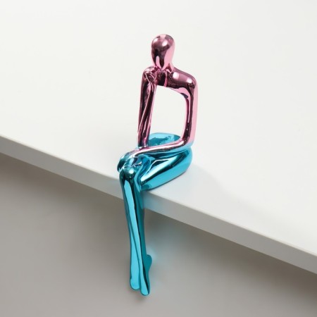 Souvenir Polystone "Consuming Man" pink-blue 5x8.5x21 cm-1
