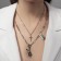 Piece "chain" rabbit and cross, color silver, l = 56 cm