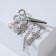 Brooch "Scissors with pendants", white color in silver