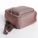 A backpack with a zipper, 5 outer pockets, pencil case, powder color