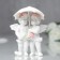 Polystone souvenir "Angels under an umbrella in pink wreaths" 8.5x6.7x6.5 cm