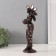 Polystone souvenir "African with a jug by a tree with mirror leaves" 11.5x8x34 cm