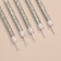 Candles for the cake "Shiny radiance", 6 pcs, white with silver