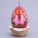 Decorative candle "Easter egg in a basket"