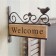 Souvenir on the door of cast iron "Welcome. Bird and patterns" 1.5x18.5x15 cm