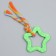 Chewing toy with a rope "Star with a tail", green